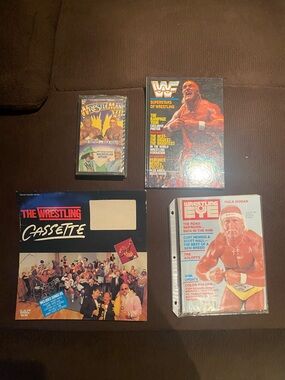 Vintage Hulk Hogan Lot with books and a vhs tape.